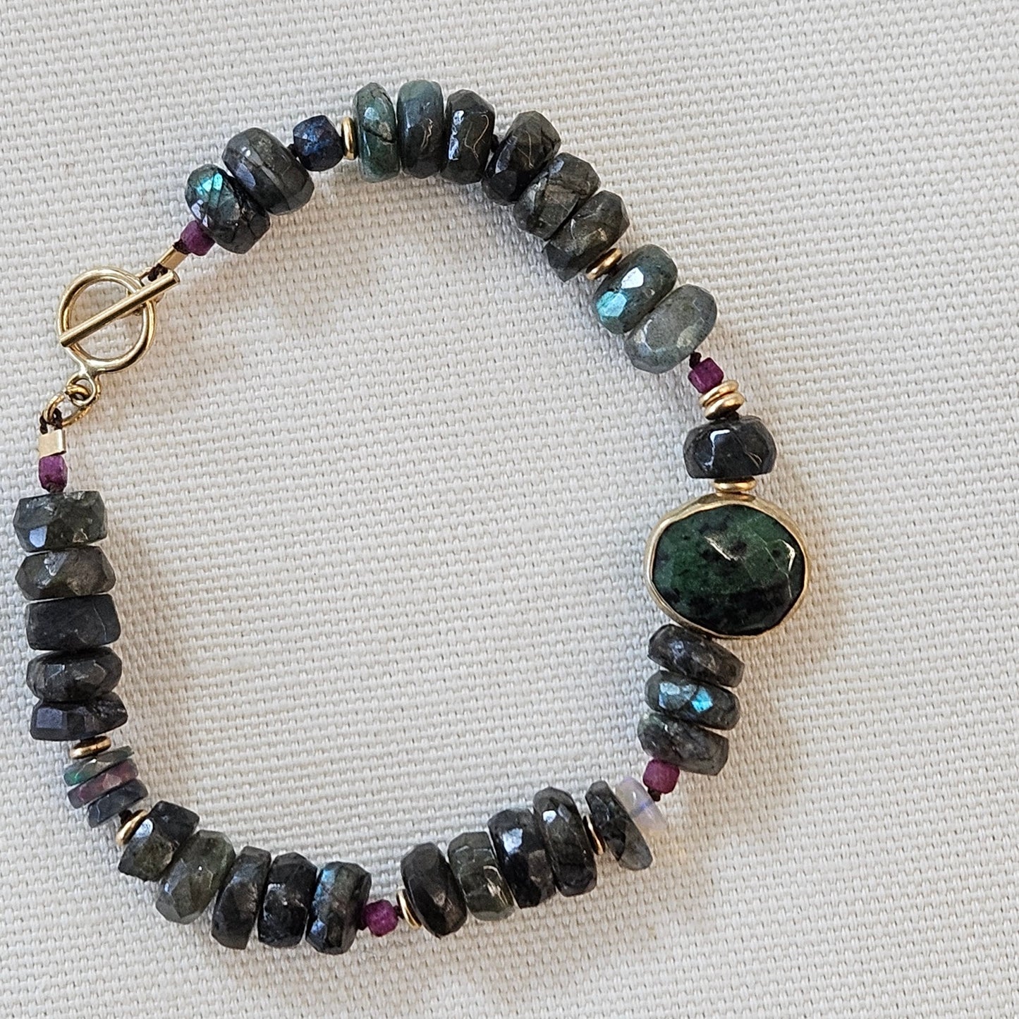 Labradorite and Ruby bracelet in green and other, handcrafted by Antiqua Jewelry