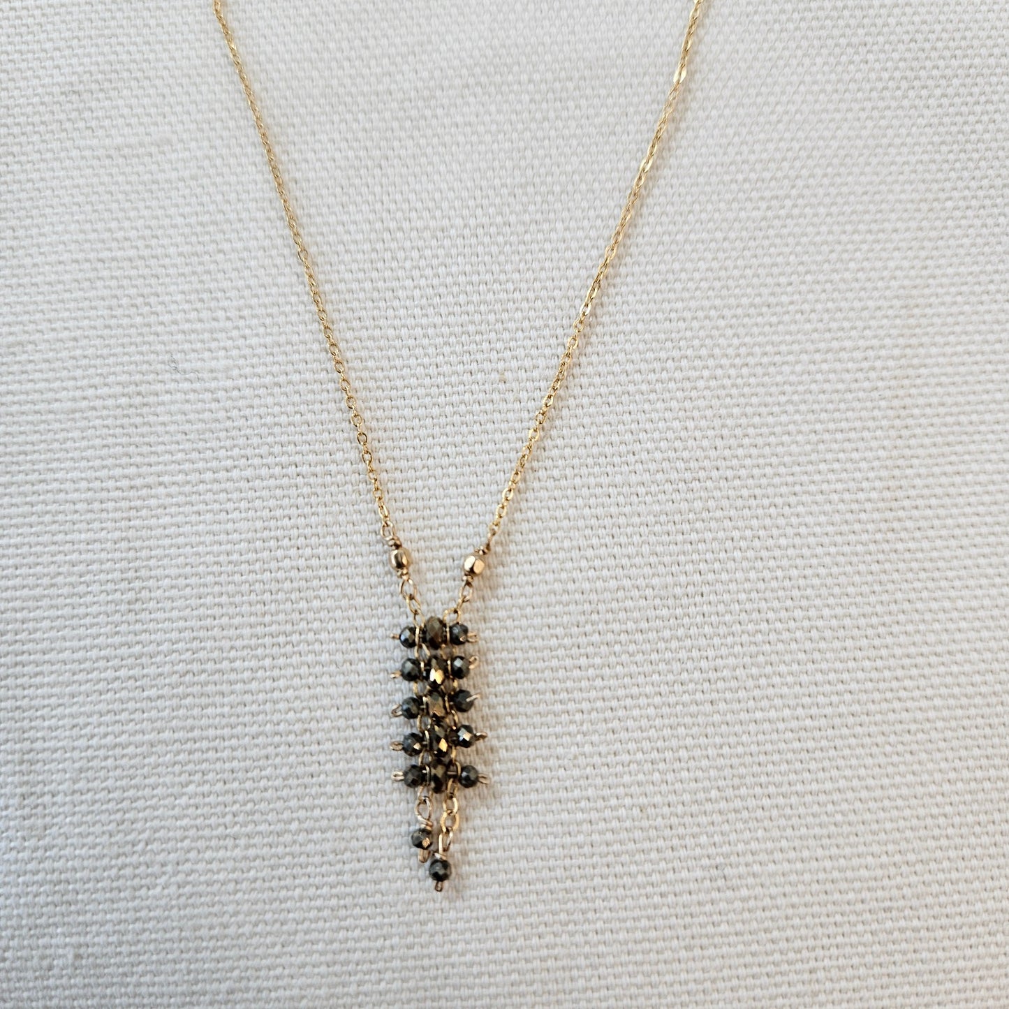 Tiny Pyrite necklace in gray, handcrafted by Antiqua Jewelry