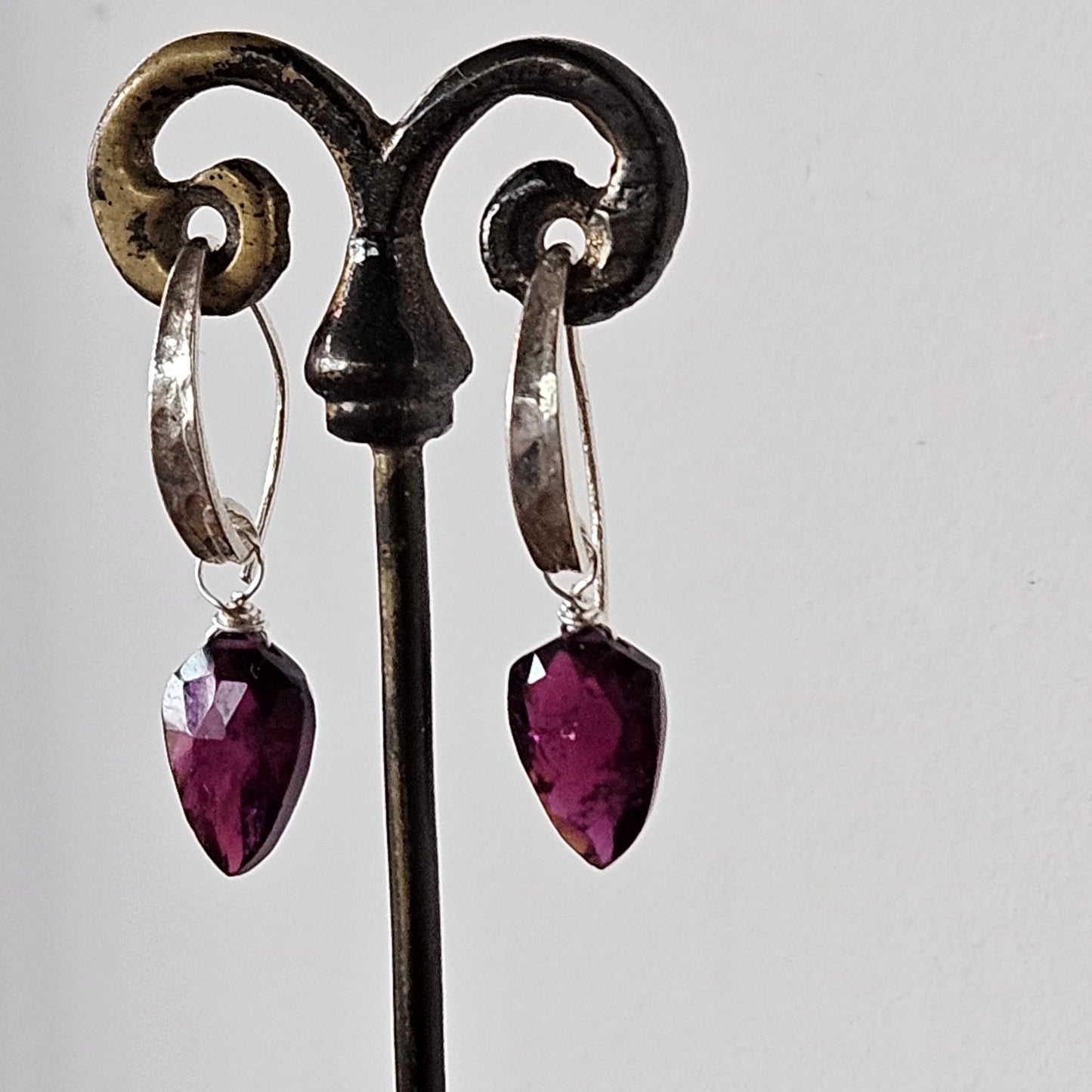 Garnet flame earrings in red and sterling silver, handcrafted by Antiqua Jewelry