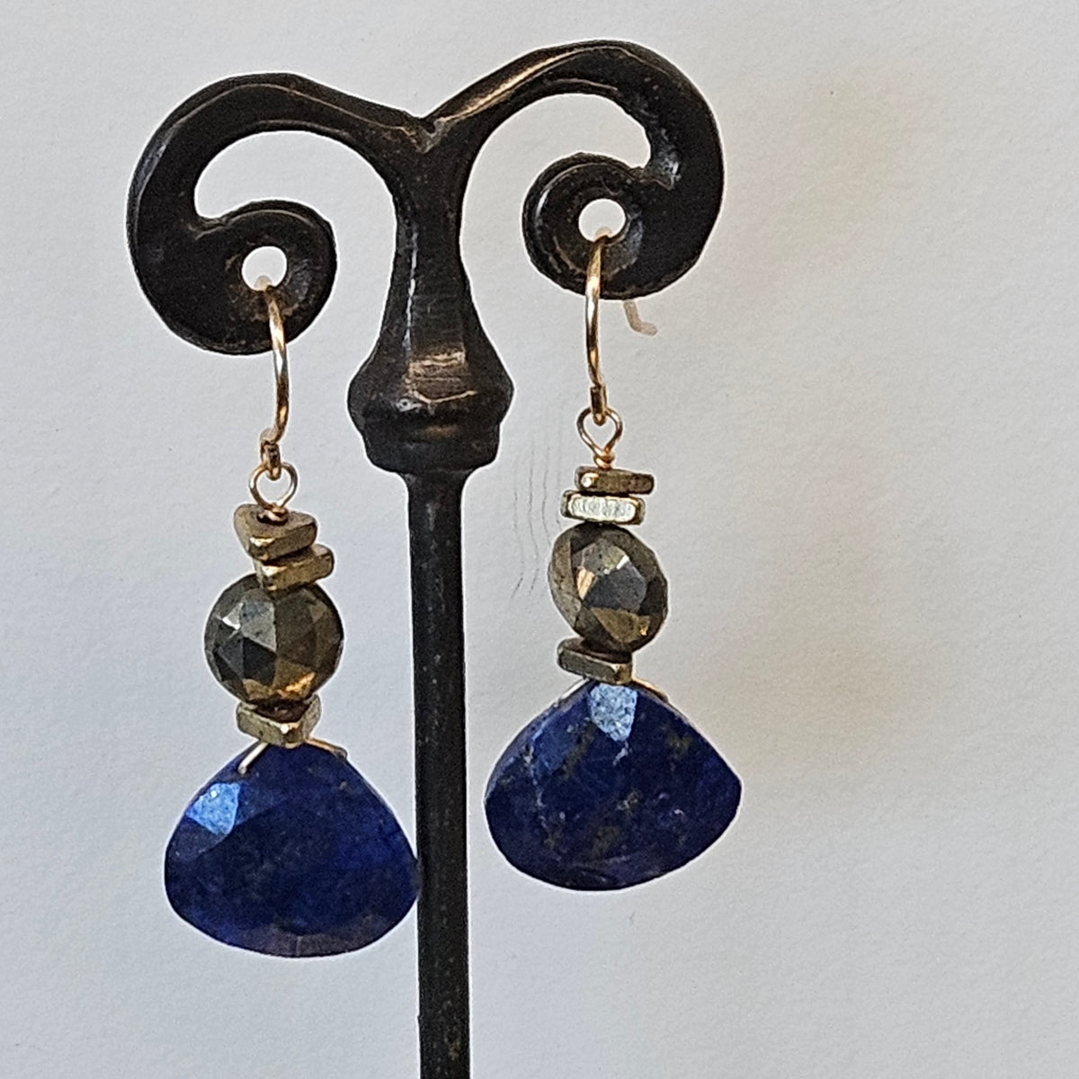 Lapis Pyrite combo earrings in blue and brass, handcrafted by Antiqua Jewelry