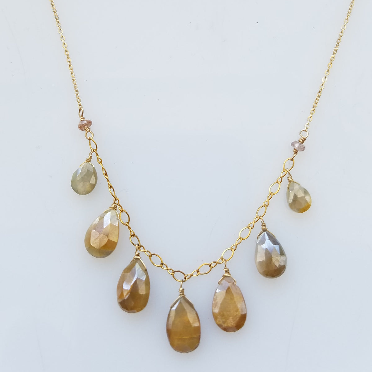 Moonstones droplets necklace in white, handcrafted by Antiqua Jewelry