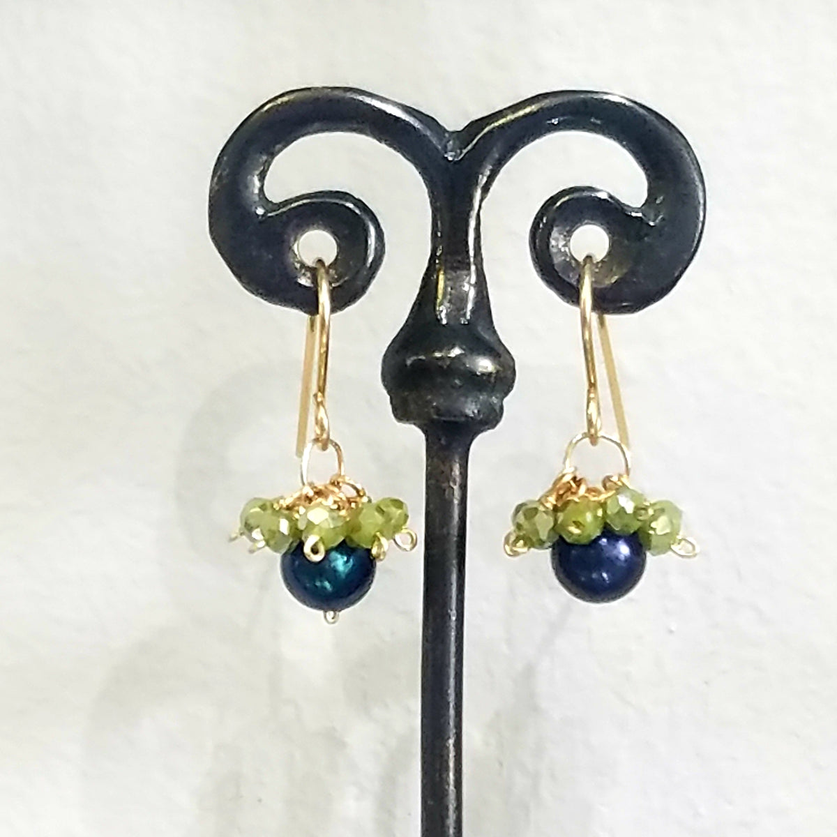 Crown pearl earrings in white, handcrafted by Antiqua Jewelry