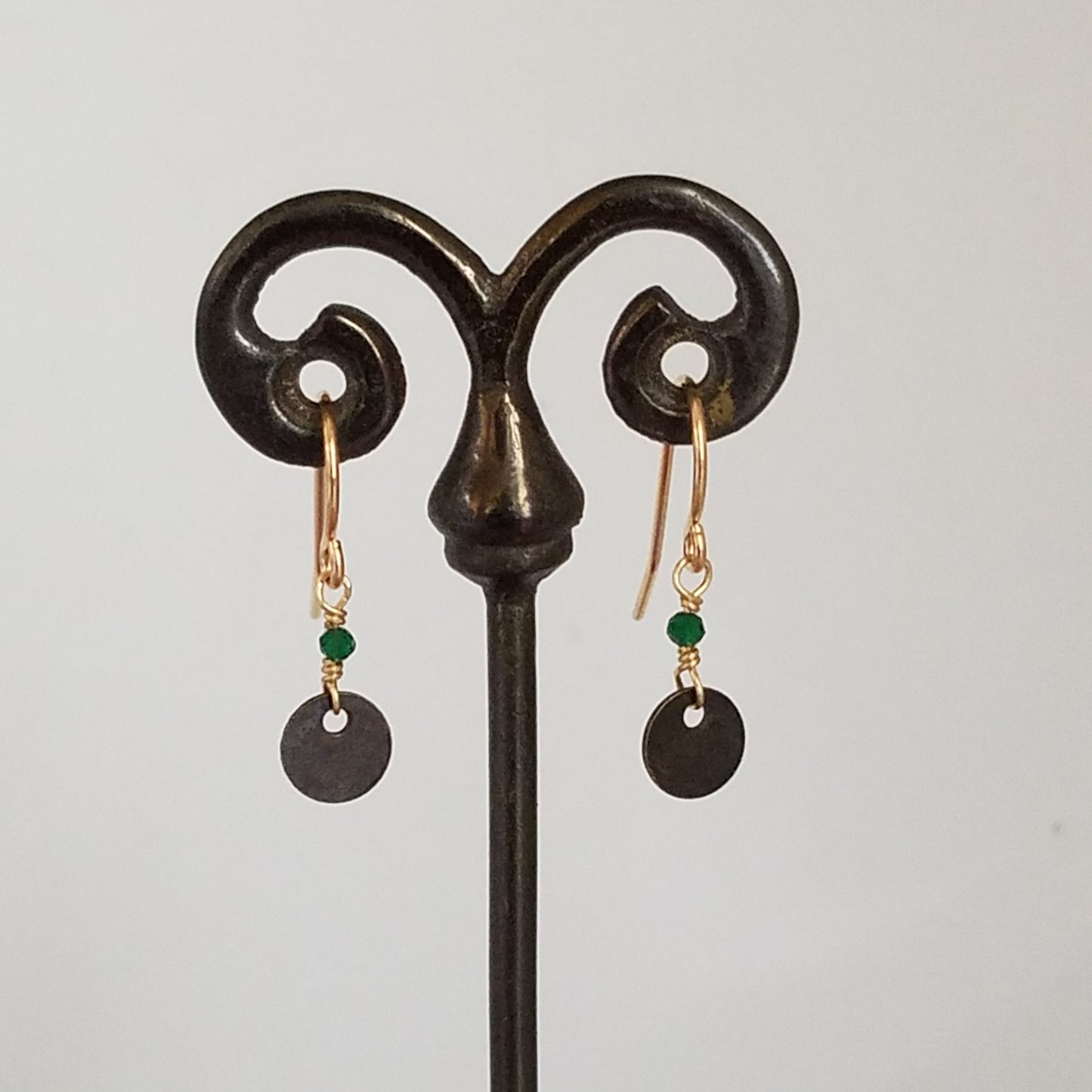 Tiny bronze disc earrings, handcrafted by Antiqua Jewelry