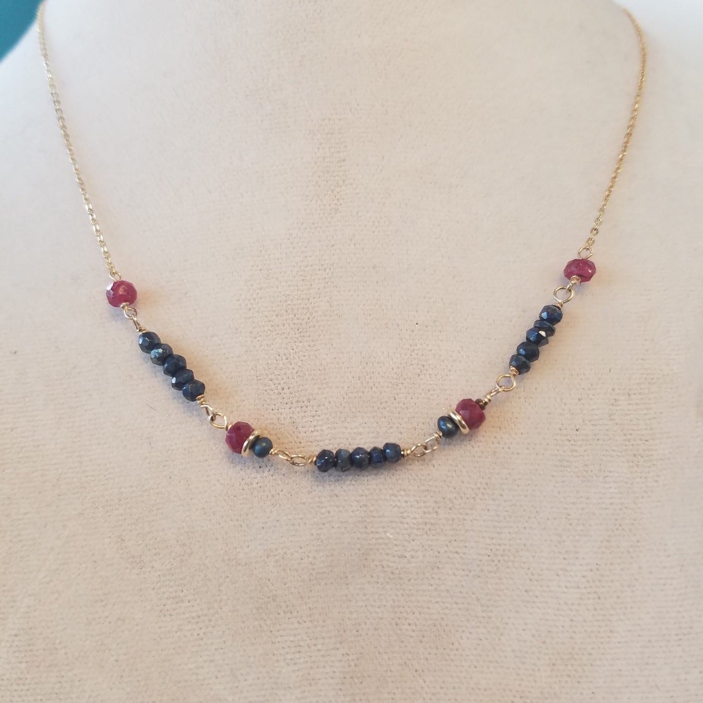 Rubys and Pyrite necklace in gray, handcrafted by Antiqua Jewelry