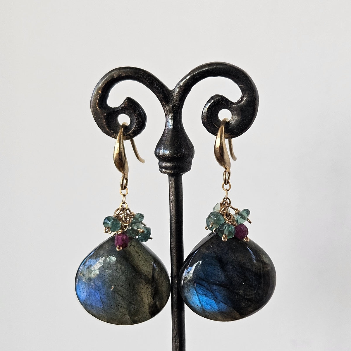Clustered Apetite on Labradorite earrings in black and gold, handcrafted by Antiqua Jewelry
