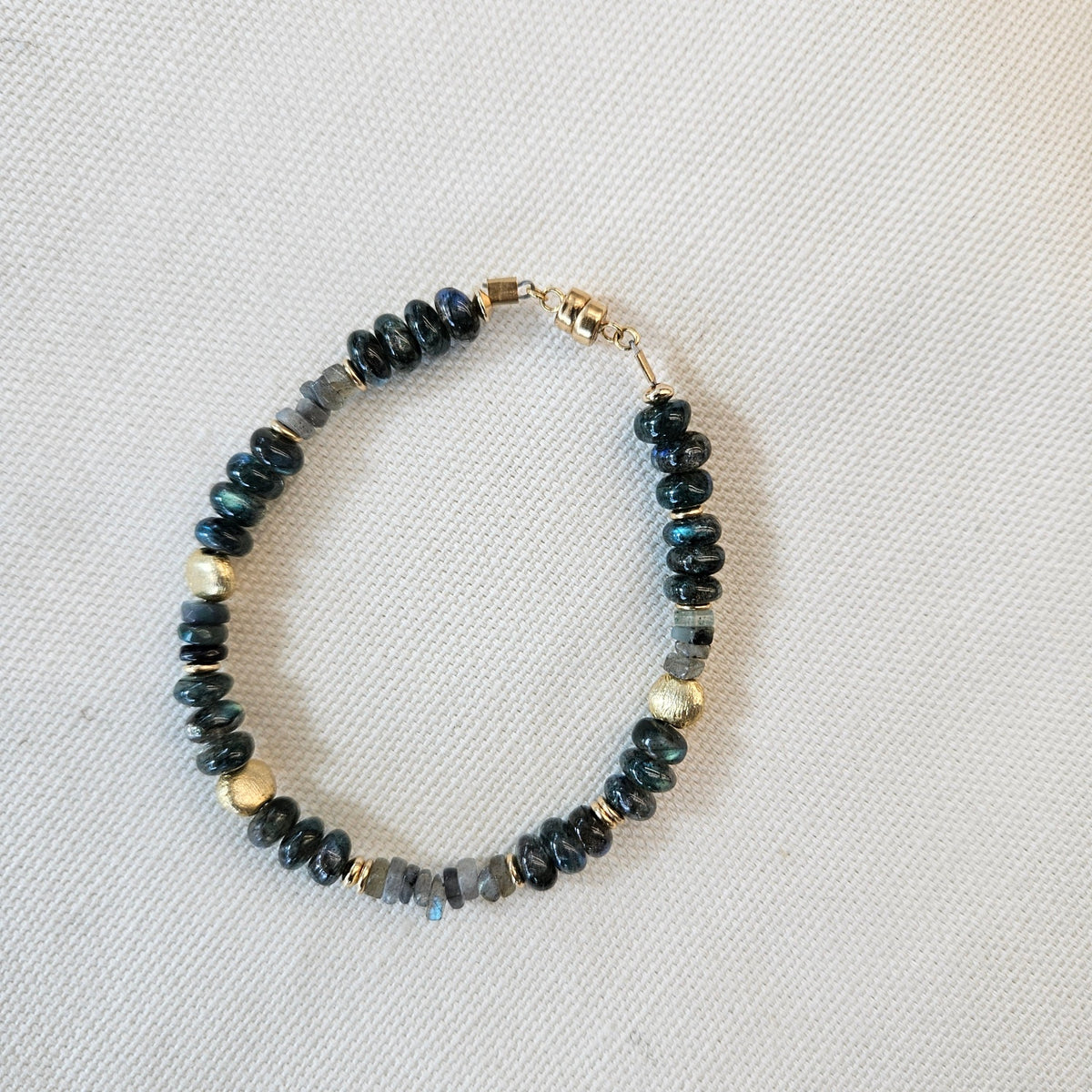 Green Lab bracelet in gold, handcrafted by Antiqua Jewelry