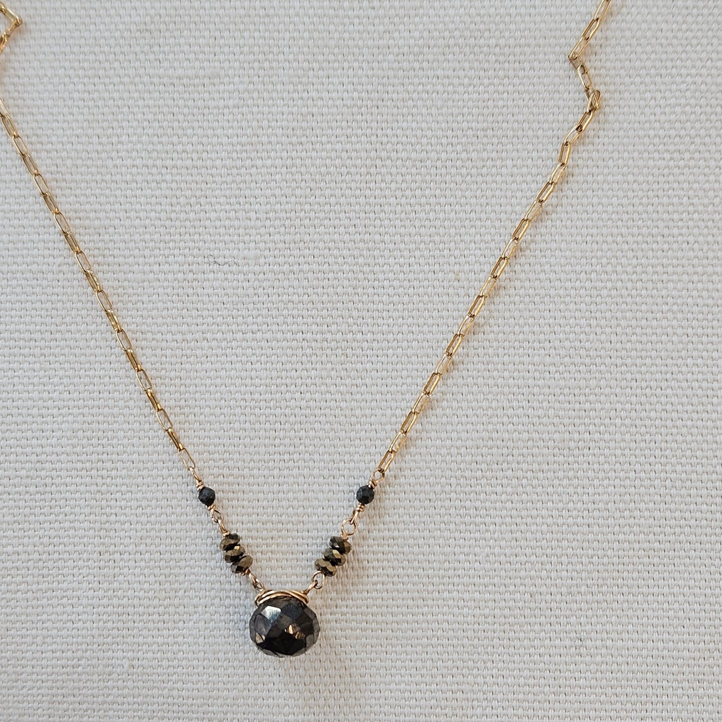 Layering Pyrite necklace in gold and gold, handcrafted by Antiqua Jewelry