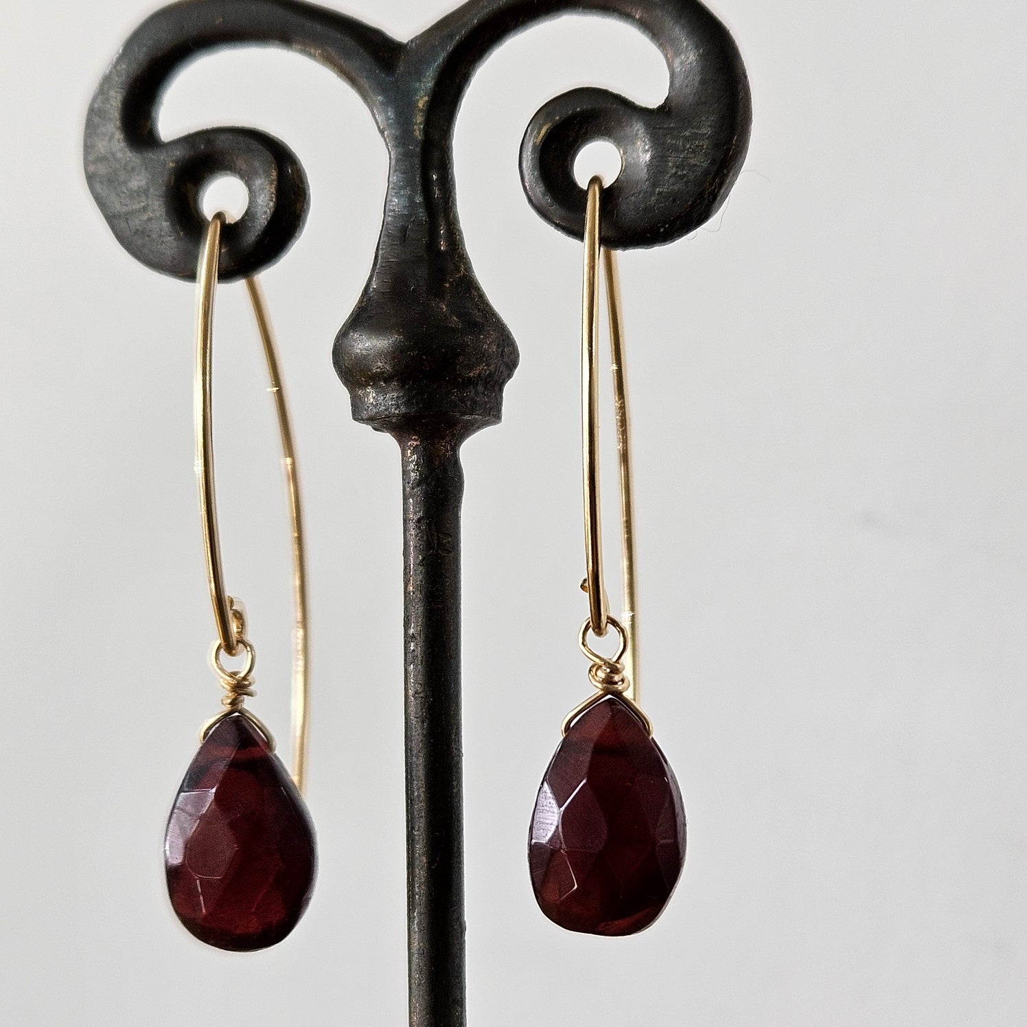 Garnet drop earrings in red and gold, handcrafted by Antiqua Jewelry