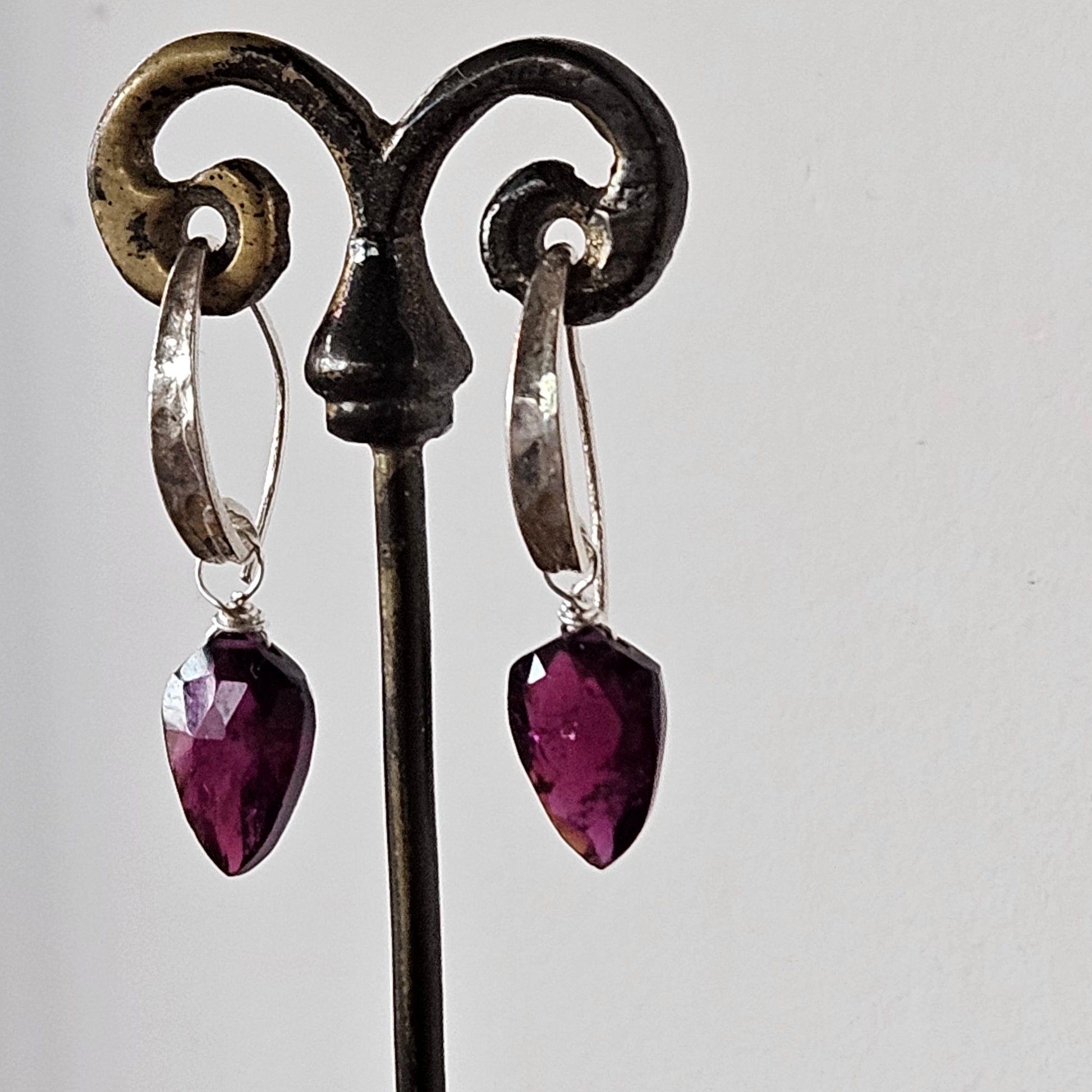 Garnet flame earrings in red and sterling silver, handcrafted by Antiqua Jewelry