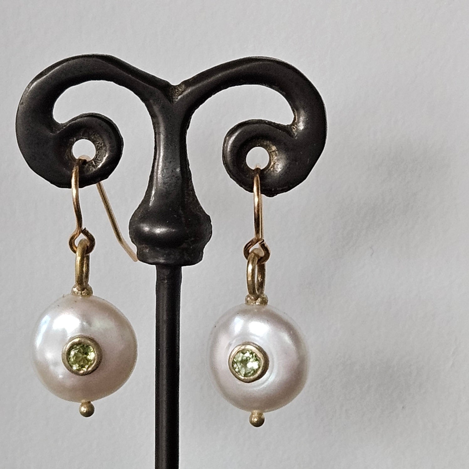 Peridot Pearl earrings in white and gold, handcrafted by Antiqua Jewelry