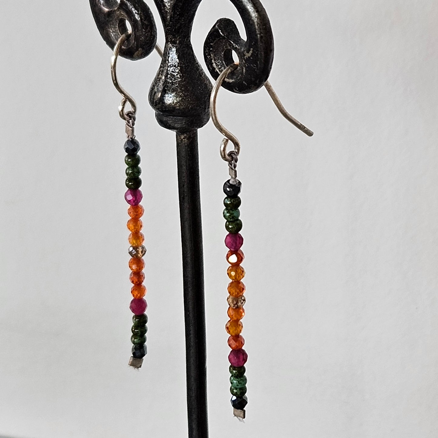 Faceted line of gems earrings in sterling silver, handcrafted by Antiqua Jewelry
