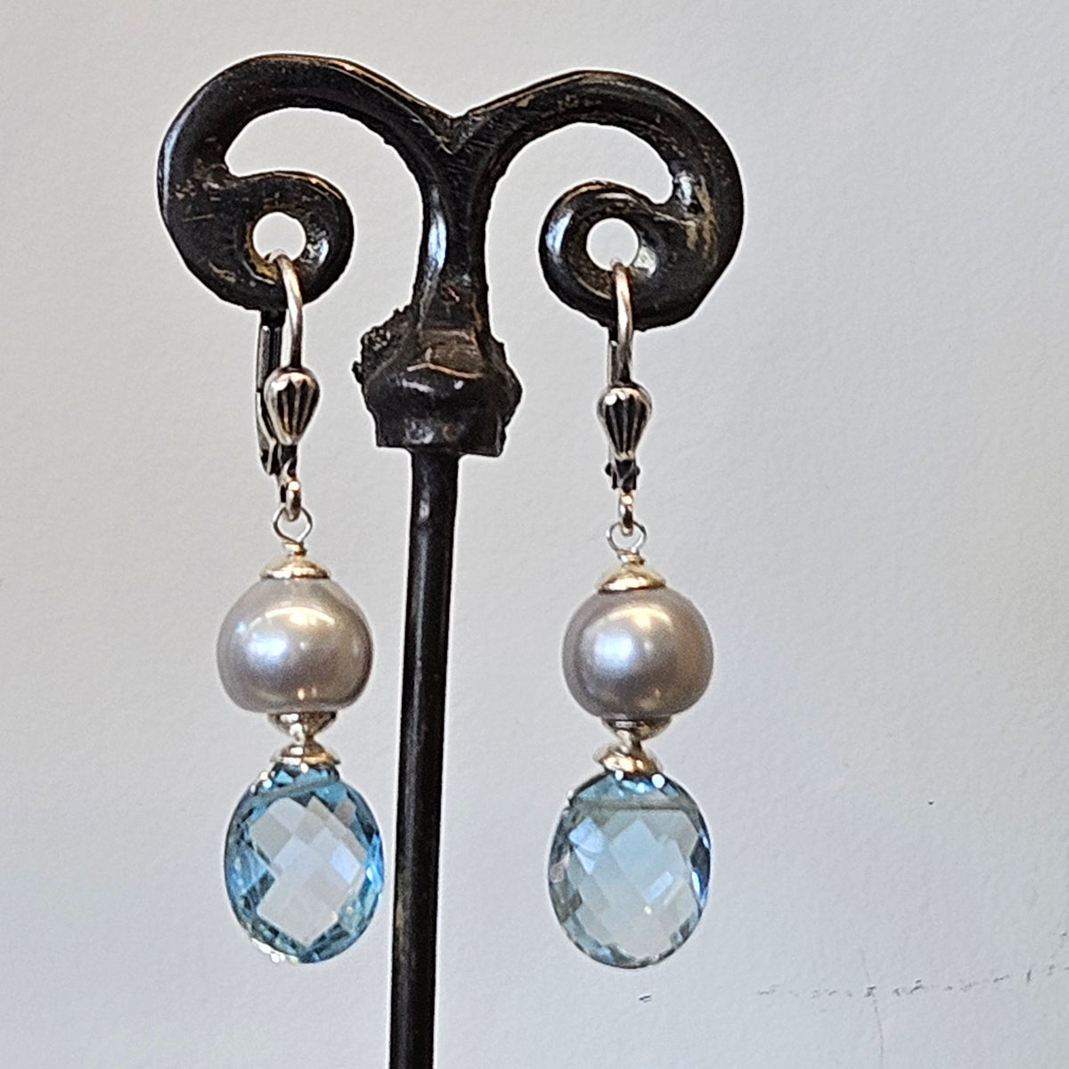 Classy Blue Topaz earrings in sterling silver, handcrafted by Antiqua Jewelry