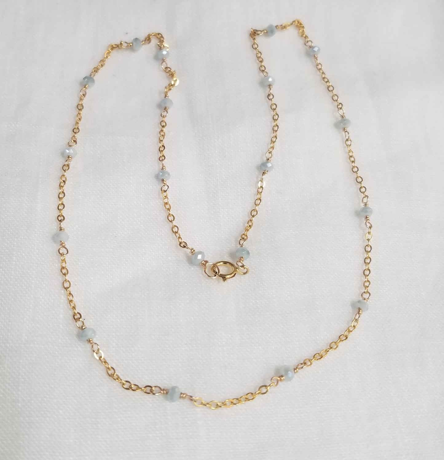 Floating on a chain Necklace, handcrafted by Antiqua Jewelry