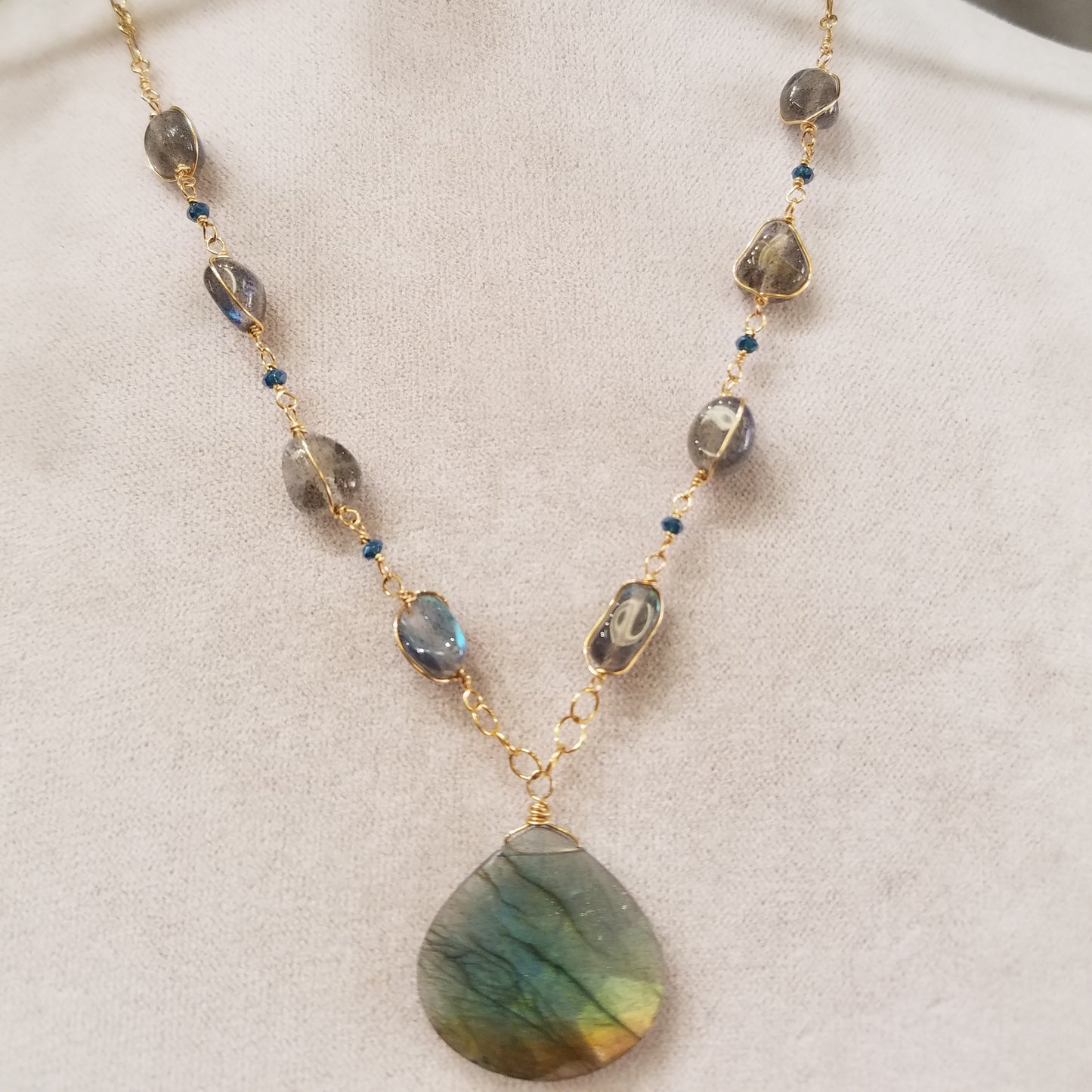 Green rainbow necklace, handcrafted by Antiqua Jewelry