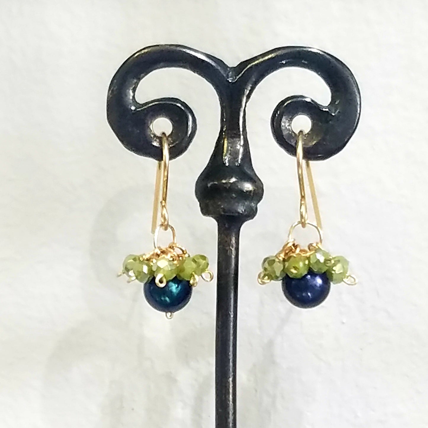 Crown pearl earrings in white, handcrafted by Antiqua Jewelry