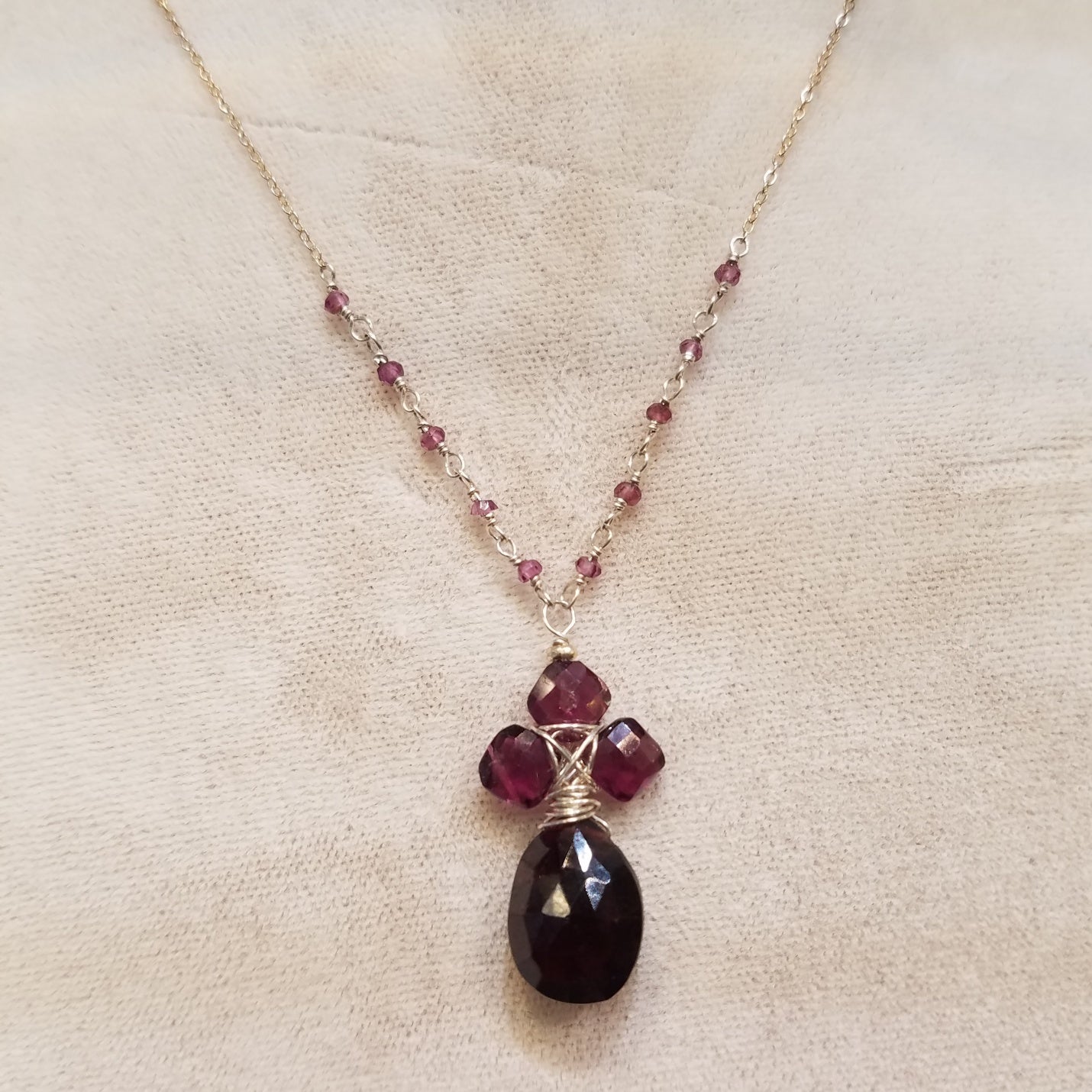Garnet pendant necklace in red, handcrafted by Antiqua Jewelry