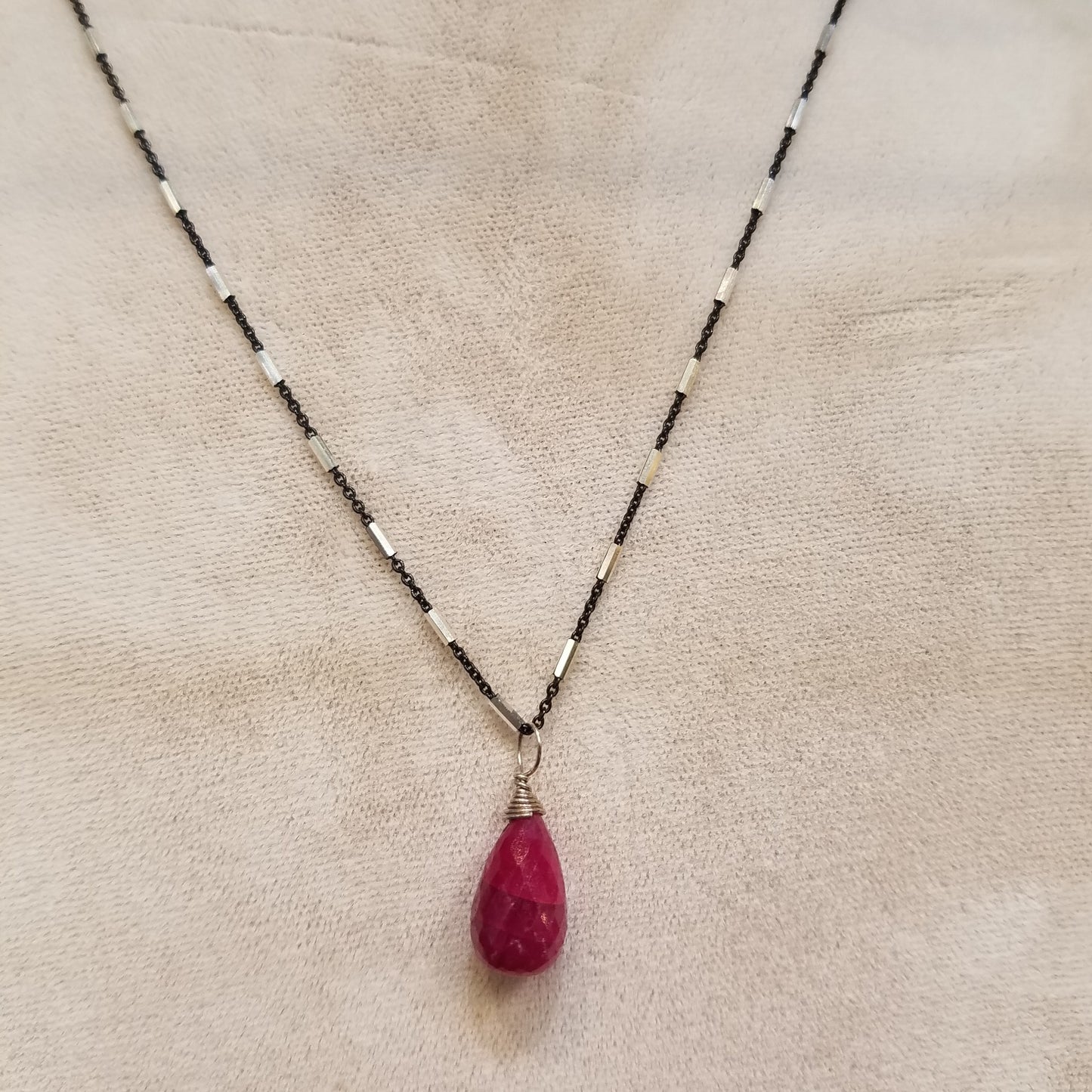 Ruby on oxidized silver chain necklace in red, handcrafted by Antiqua Jewelry
