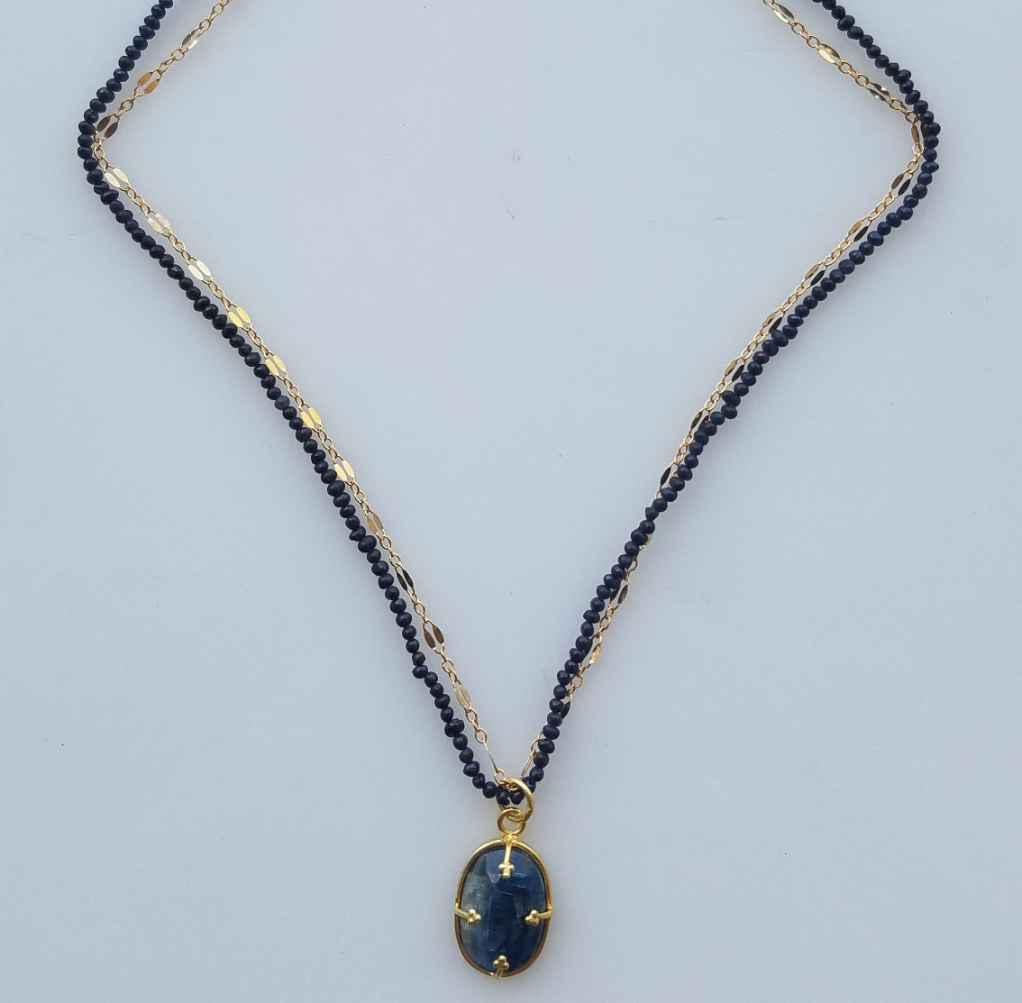 Midnight blue seed pearls and Kyanite Necklace, handcrafted by Antiqua Jewelry