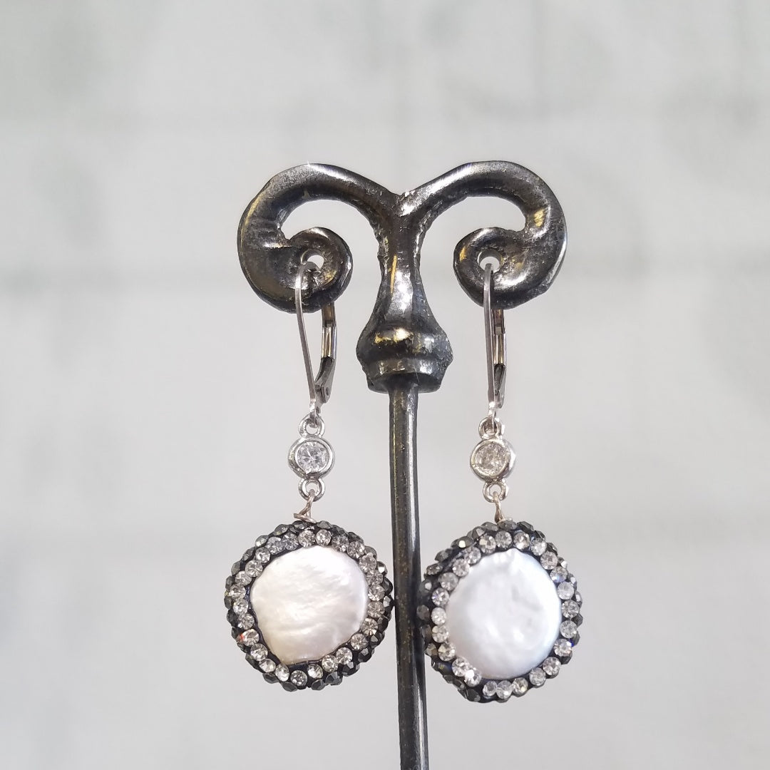 Round pearls surrounded with sparkle earrings in white, handcrafted by Antiqua Jewelry