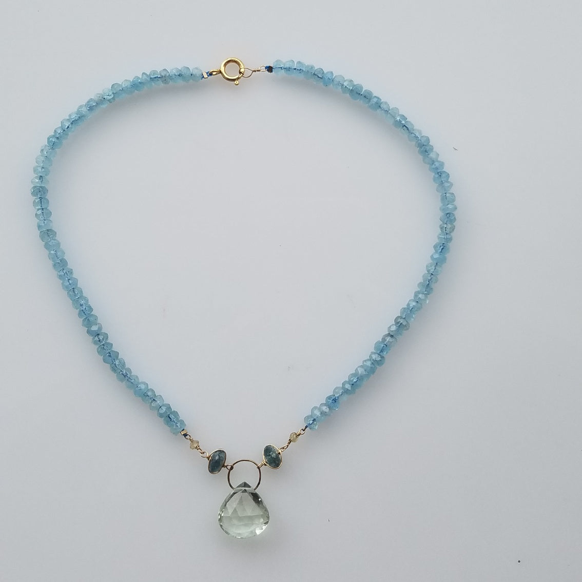 The calming element necklace, handcrafted by Antiqua Jewelry