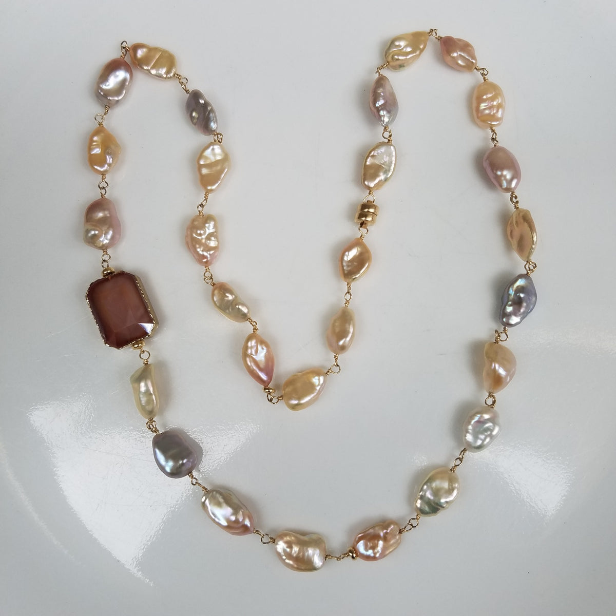 Peach perfect pearls necklace/bracelet, handcrafted by Antiqua Jewelry