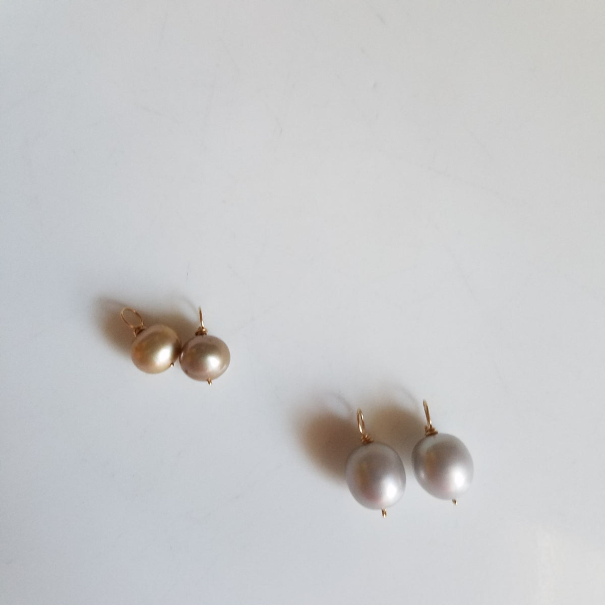 Pearl charms for hoop earrings in white, handcrafted by Antiqua Jewelry