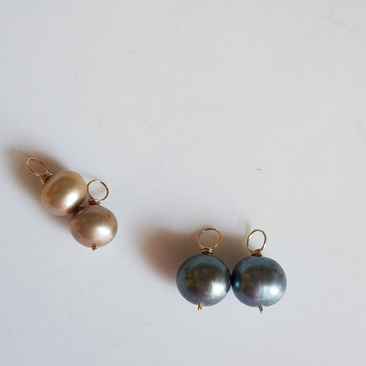 Two tones of pearls for hoop earrings in white, handcrafted by Antiqua Jewelry