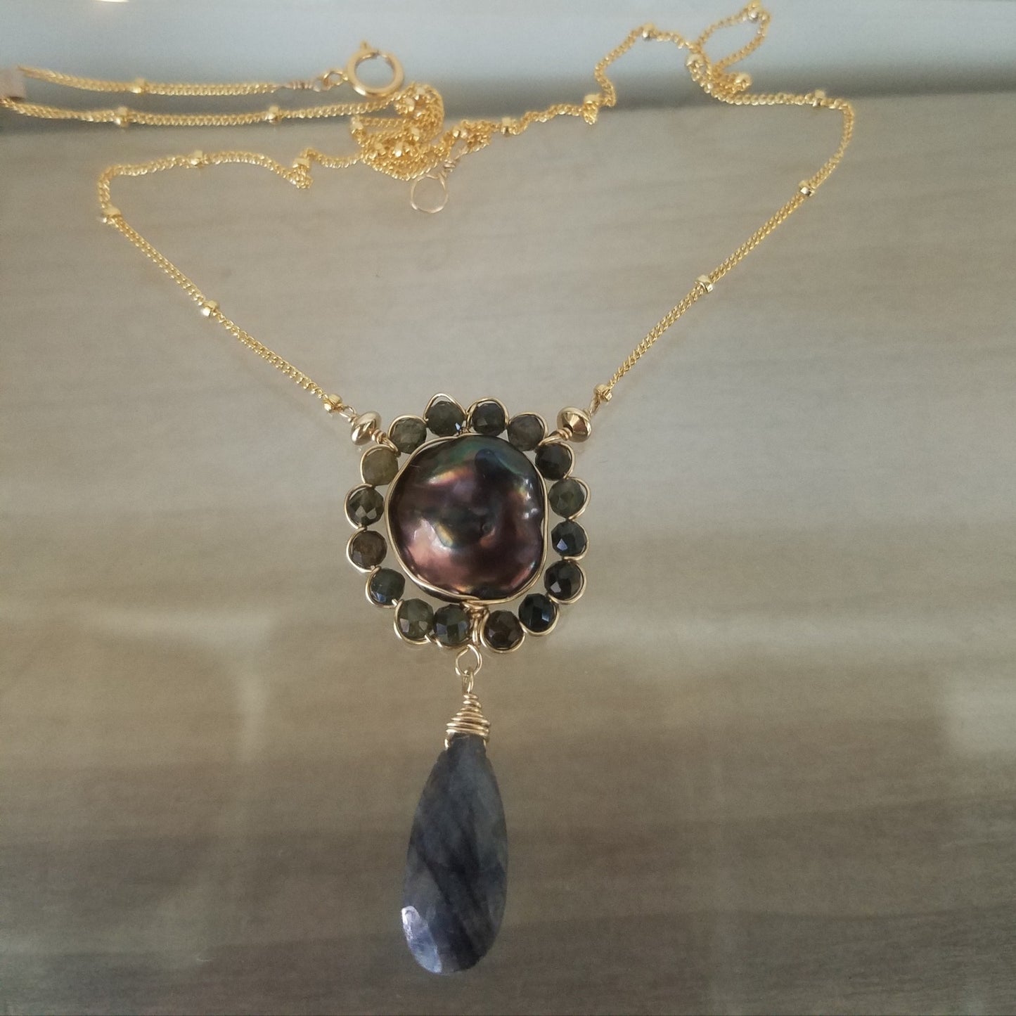 Blue Labradorite, Tourmaline and a Pearl necklace, handcrafted by Antiqua Jewelry