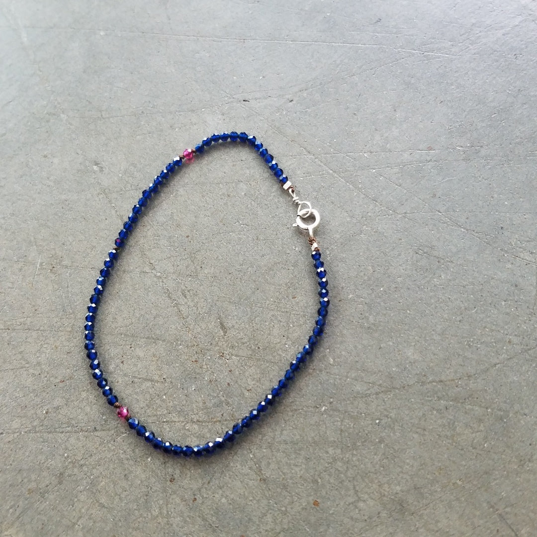 Tiny blue and red bracelet, handcrafted by Antiqua Jewelry